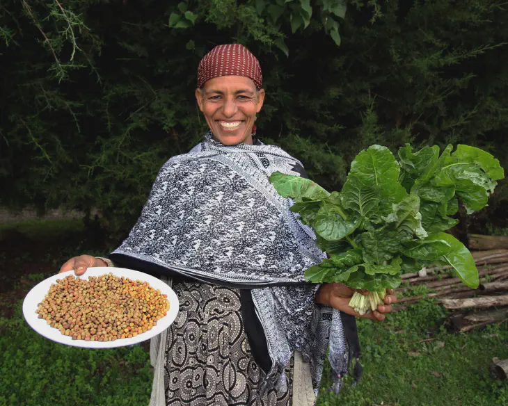 farmer displaying nutrient rich commodities